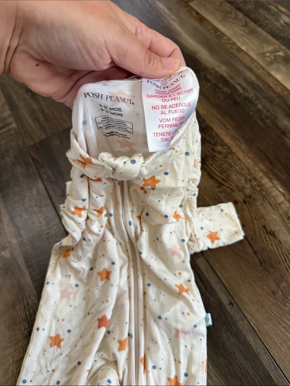 Posh Peanut Cream Footed One-Piece with Orange & Pink Stars